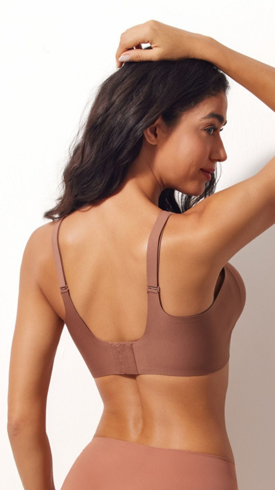 Adult model showing the adjustable back of the Bra Top